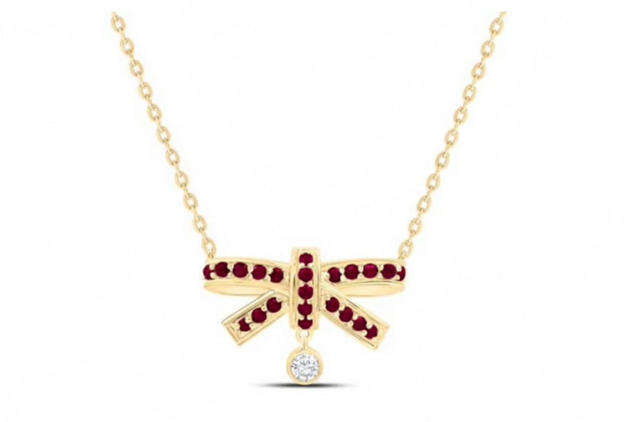 14K yellow gold bow necklace with 1/3 carat gemstone and natural diamonds on 18 inch chain