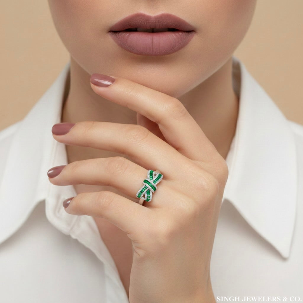 Sterling silver bow ring worn on hand showing stones and design
