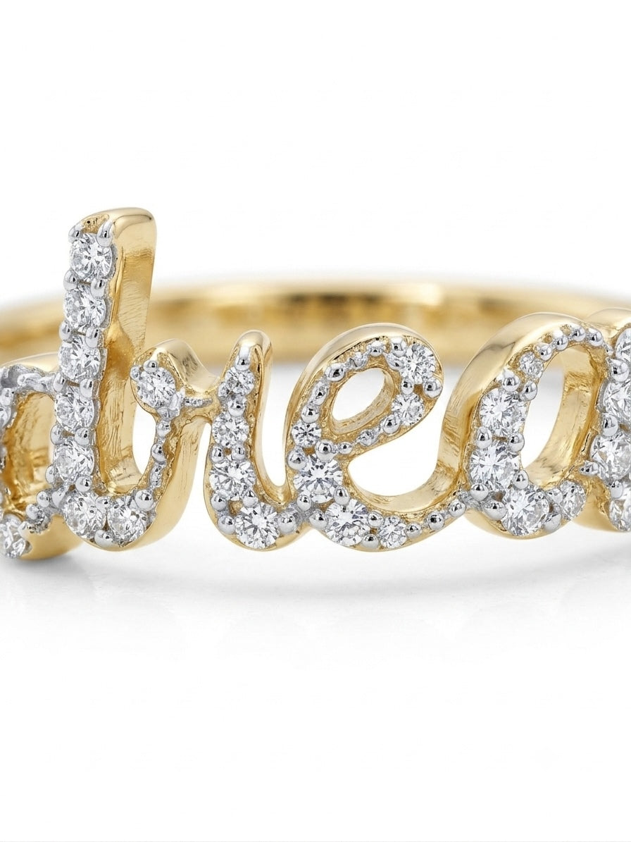 Close-up of diamond dream ring in 10K yellow gold with sparkling stones