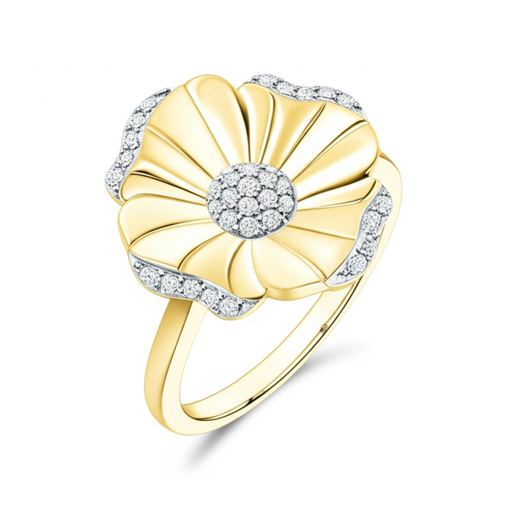 Gold ring with diamond accents on a white background