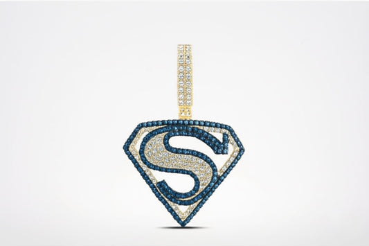 Superman logo pendant with blue gemstones on a white background