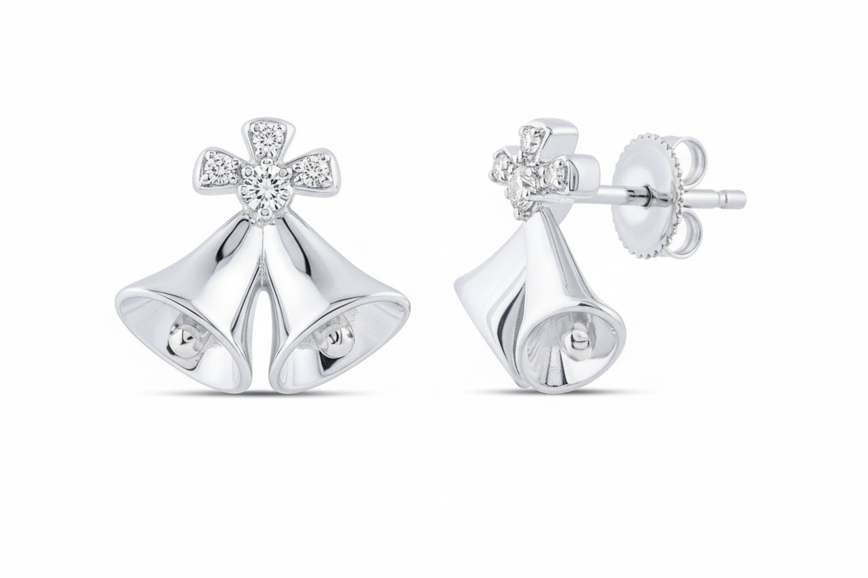 Silver bell-shaped earrings with clear gemstones on a white background