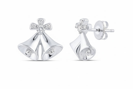 Silver bell-shaped earrings with clear gemstones on a white background