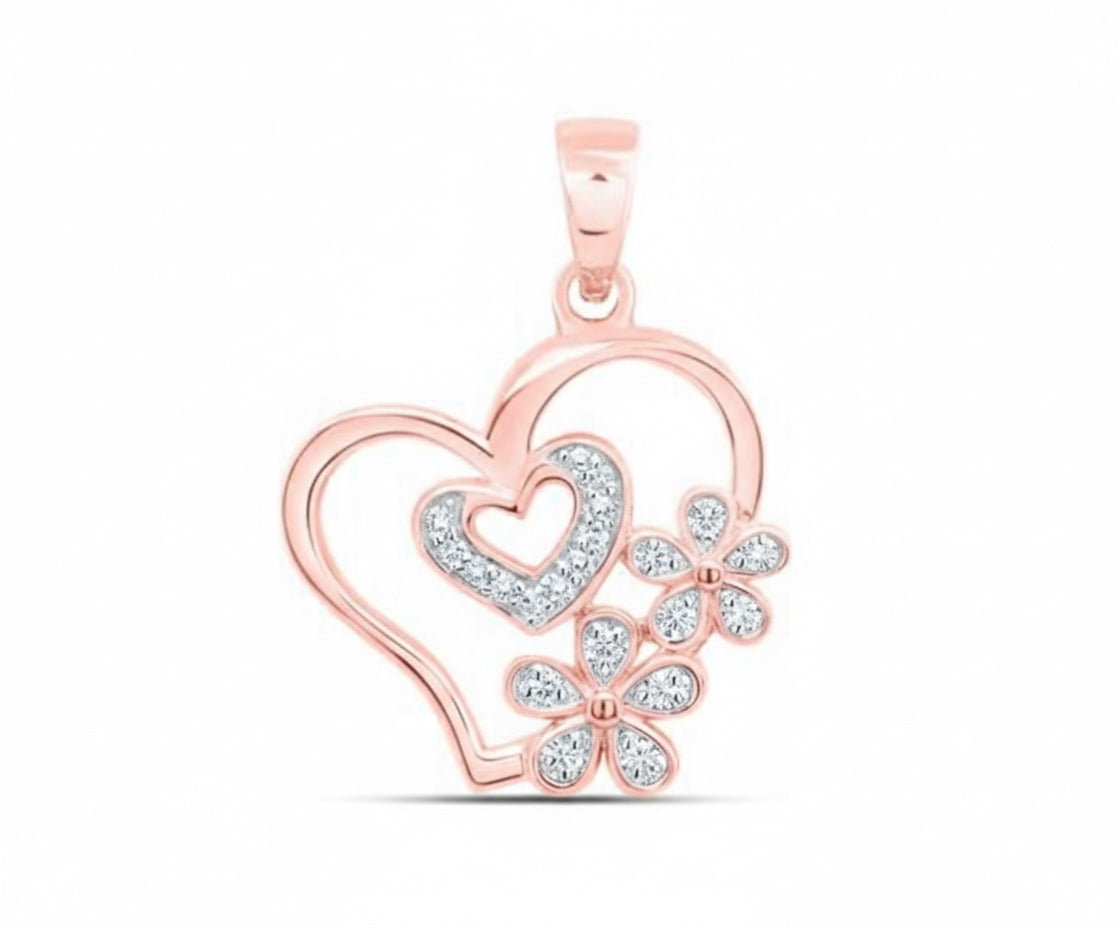 Rose gold heart-shaped pendant with floral design on a white background