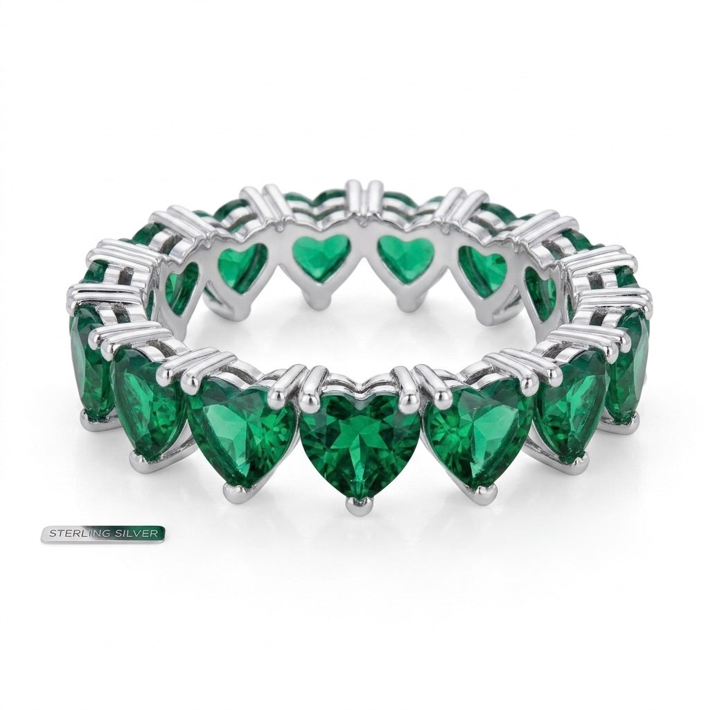 sterling silver eternity ring band with green heart-shaped stones