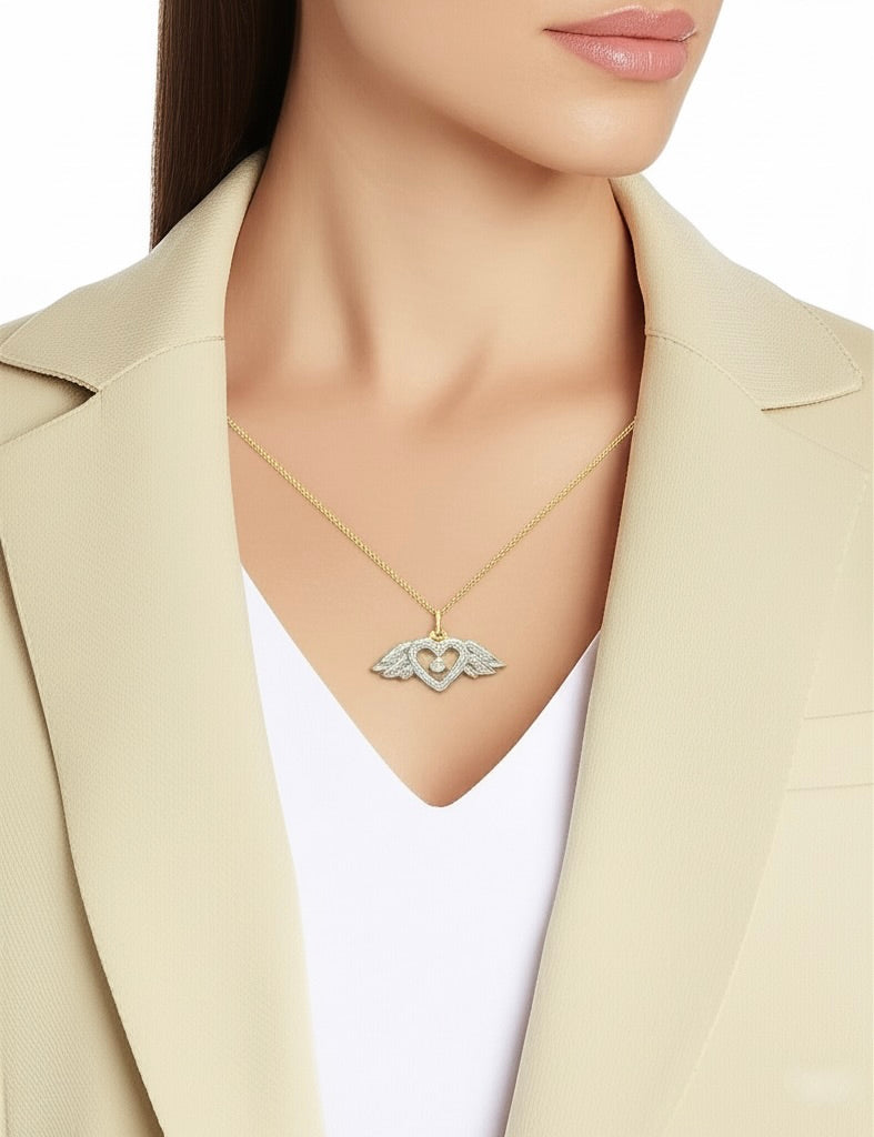 Gold 'MOM' wings and heart charm with diamond accent"