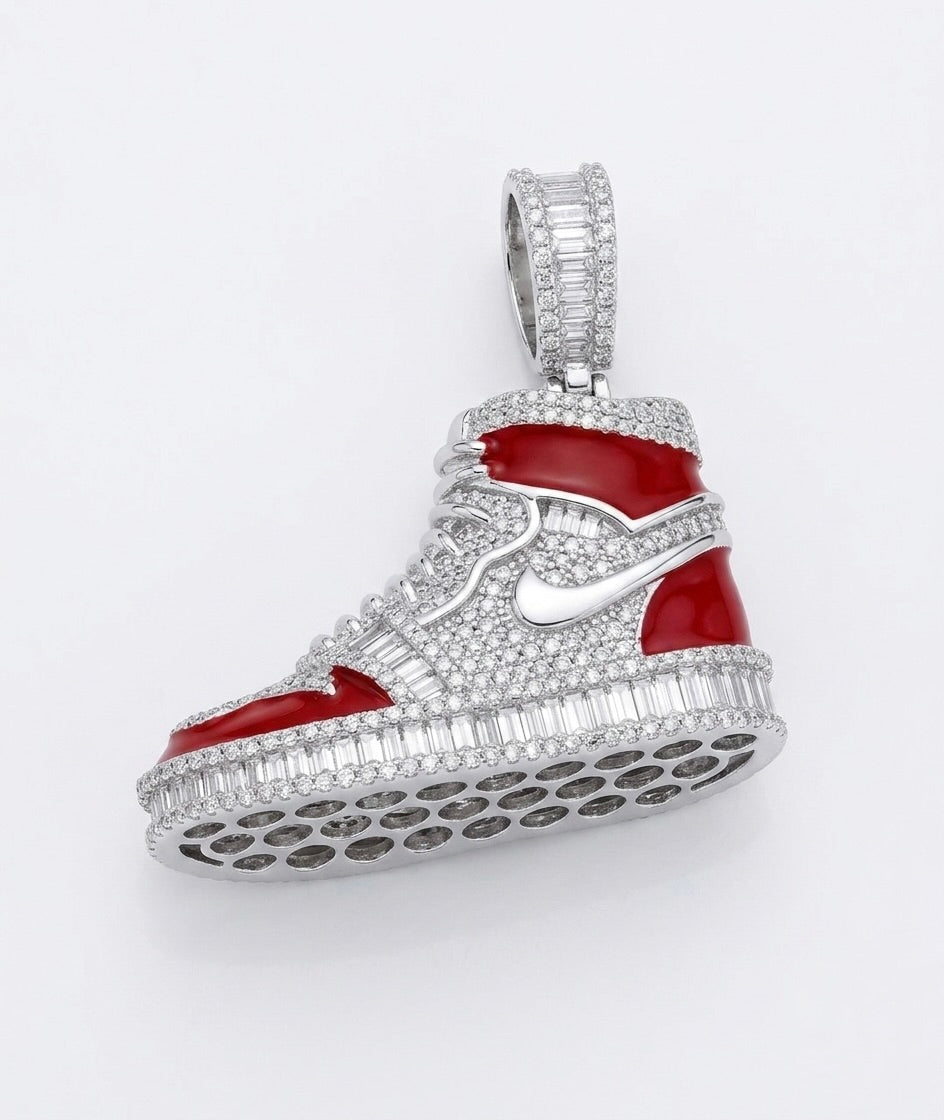 Close-up of sterling silver sneaker charm with detailed craftsmanship.