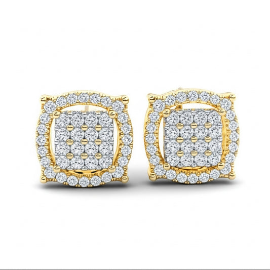 Gold and diamond earrings on a white background