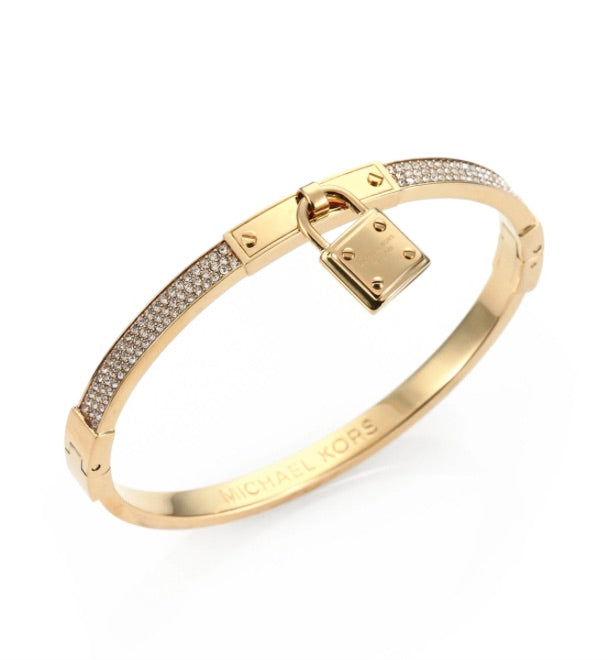 Close-up detail of the Michael Kors Gold Tone Bangle showcasing its design