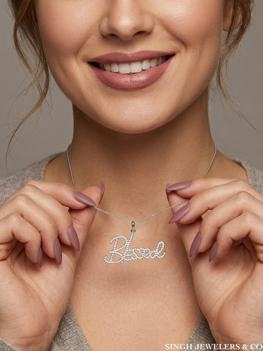 Close-up of Sterling Silver Blessed Charm featuring moissanite stones