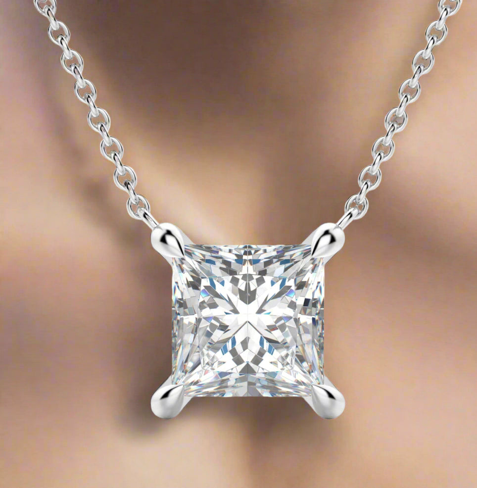 0.25 Cttw Moissanite princess cut pendant with 18-inch sterling silver chain