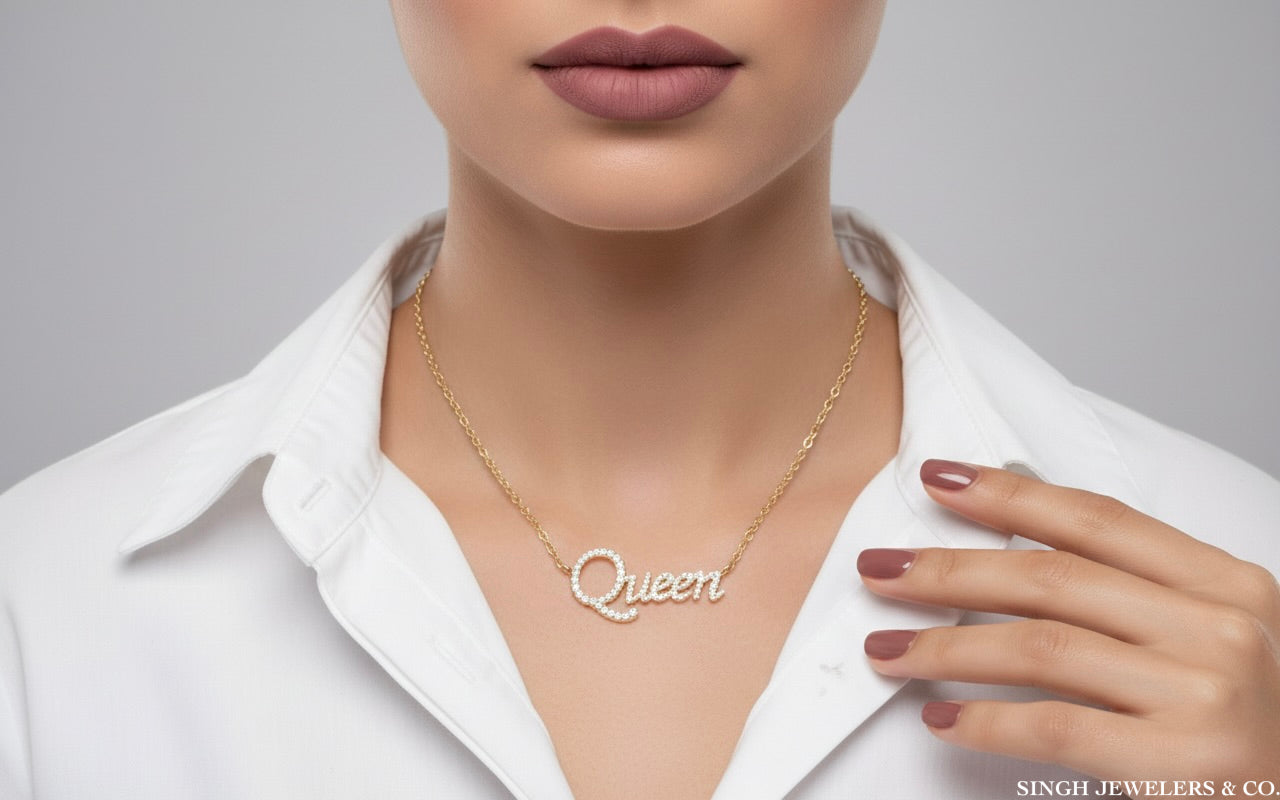 Women’s 14K gold diamond Queen necklace