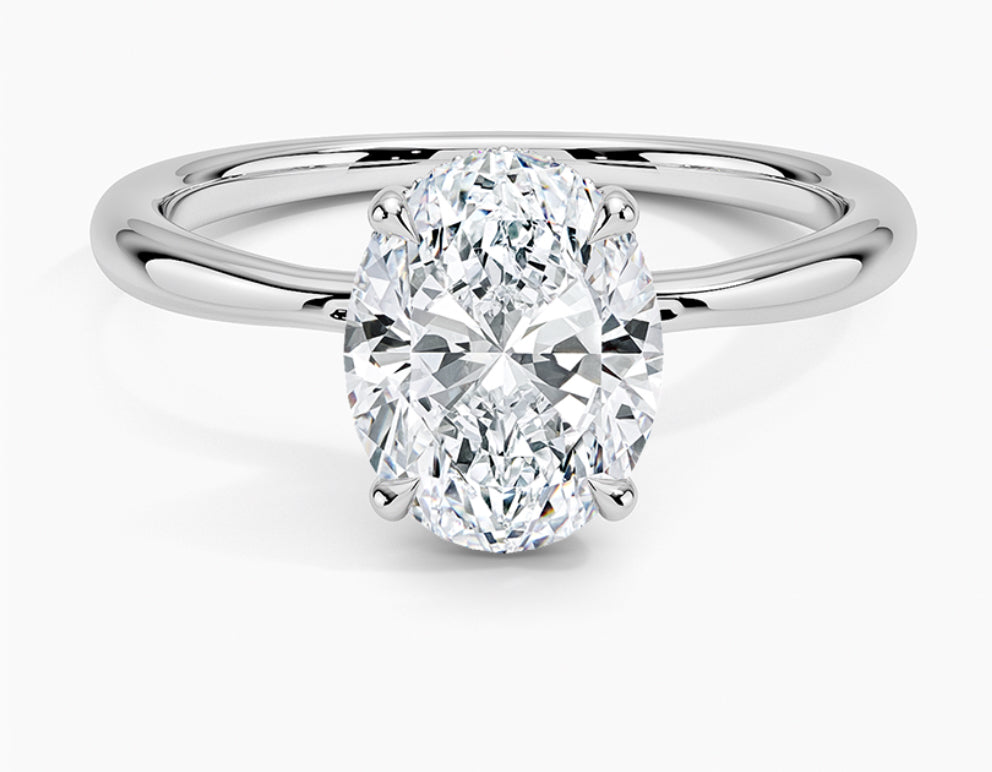 Close-up of 1.00 CT oval cut moissanite stone in sterling silver engagement ring