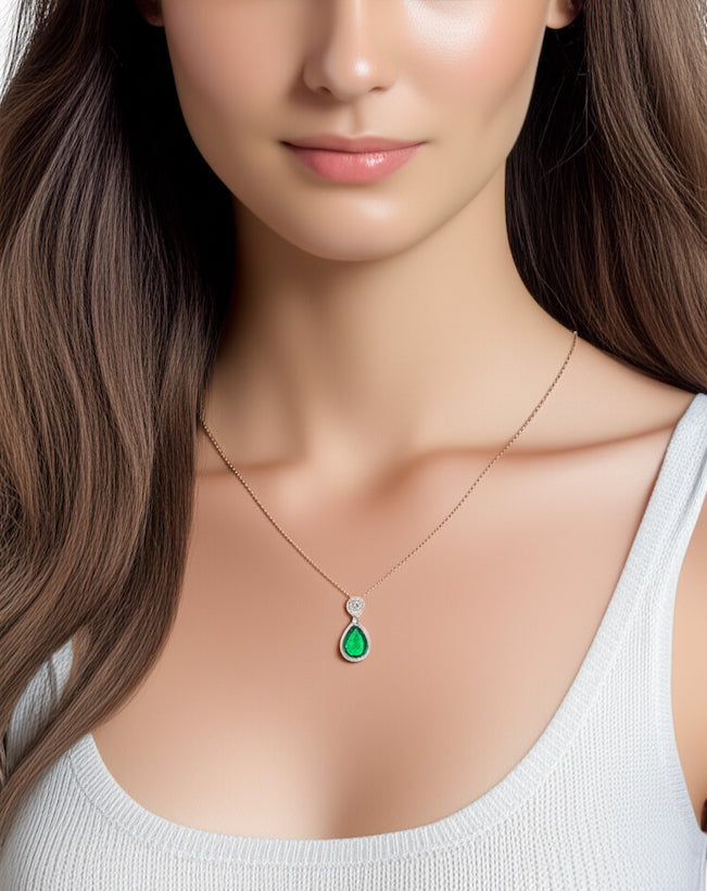 Model wearing sterling silver green CZ birthstone necklace
