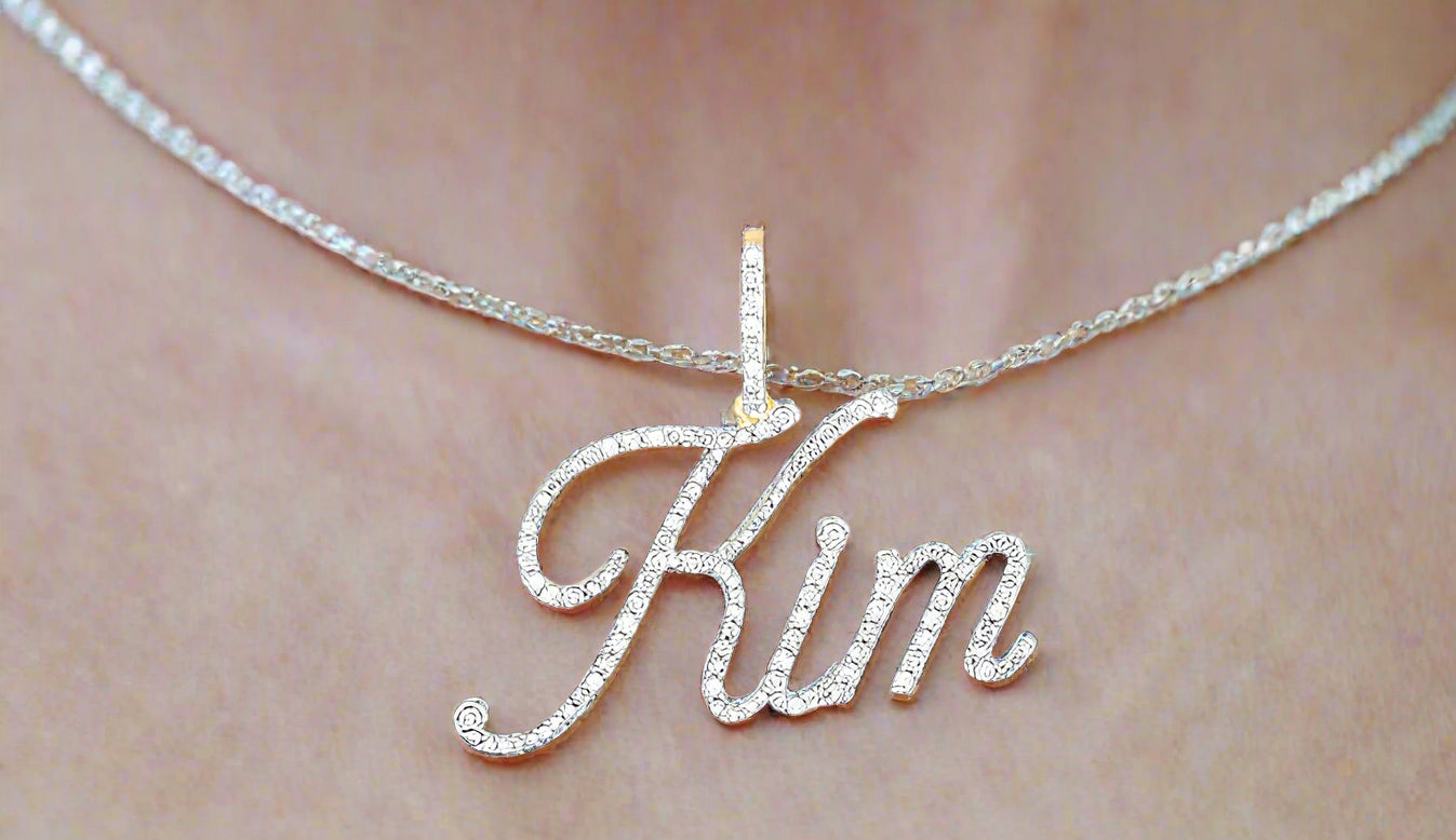 Kim custom name pendant in 10K yellow gold with 5/8 Cttw diamonds