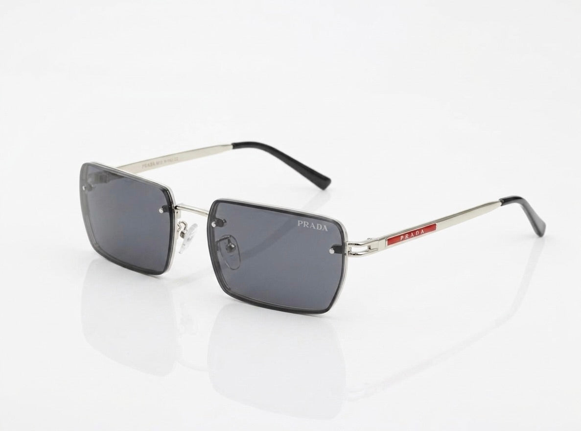 Side profile of Prada black frame oversized sunglasses luxury eyewear