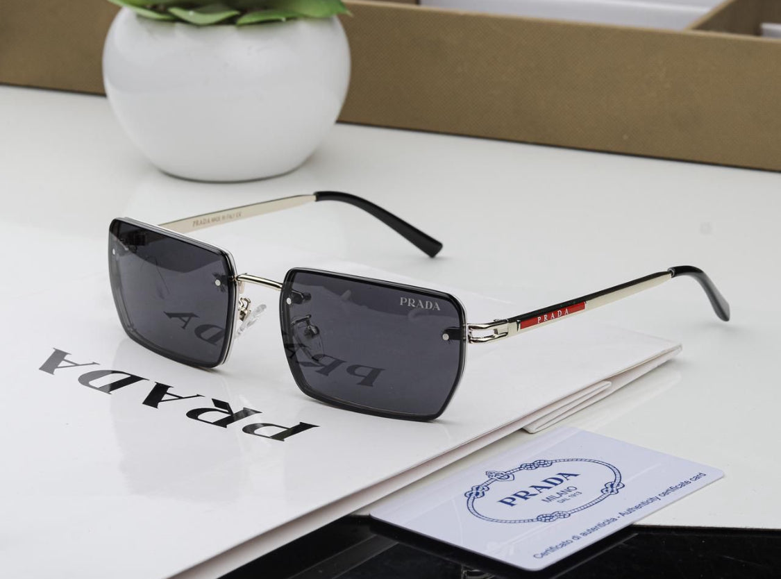 PRADA oversized sunglasses with black frame and tinted lenses