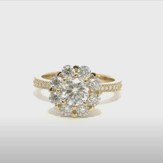 Elegant floral design engagement ring with sparkling moissanite