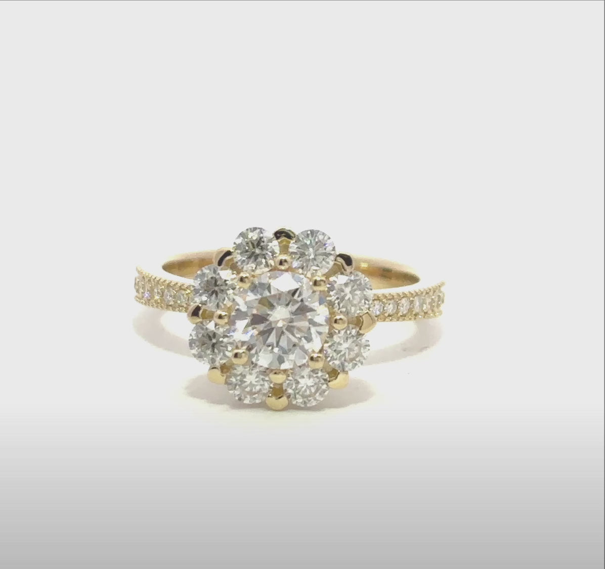 Elegant floral design engagement ring with sparkling moissanite