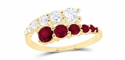 Round-cut ruby and diamond ring in 14k gold