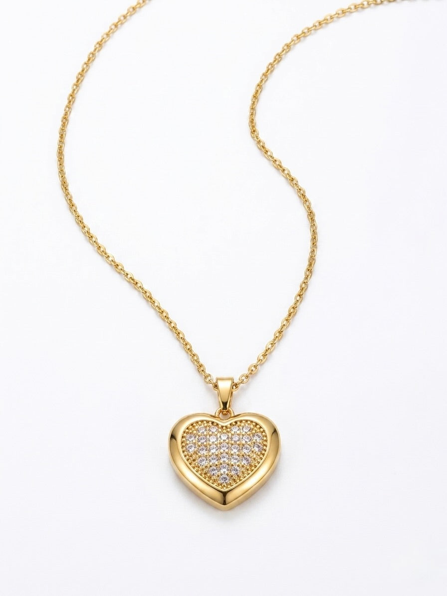 Stainless steel gold tone heart necklace with white sapphires, adjustable from 20 inches to 24 inches