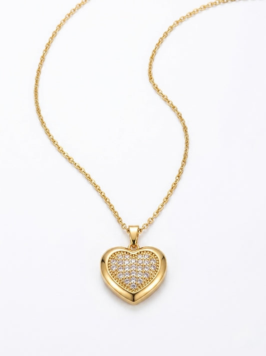 Stainless steel gold tone heart necklace with white sapphires, adjustable from 20 inches to 24 inches