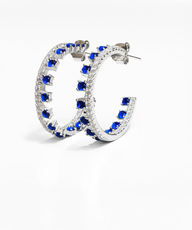 Sterling silver hoop earrings with synthetic blue sapphire and CZ stones