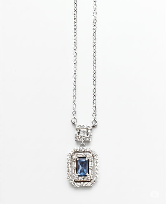 Sterling silver necklace with emerald cut blue topaz CZ pendant