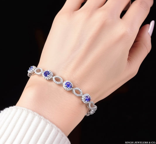 Woman wearing sterling silver Ceylon sapphire bracelet