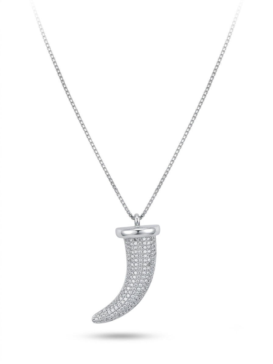 Close-up of Sterling Silver Lion Tooth pendant with cubic zirconia detailing