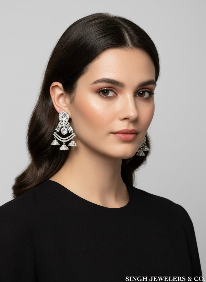 Sterling silver dangling earrings with sparkling cubic zirconia stones, elegant design perfect for special occasions or everyday wear.