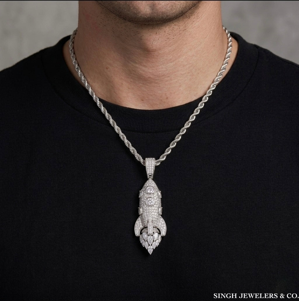 Iced-out rocket pendant in polished 925 sterling silver