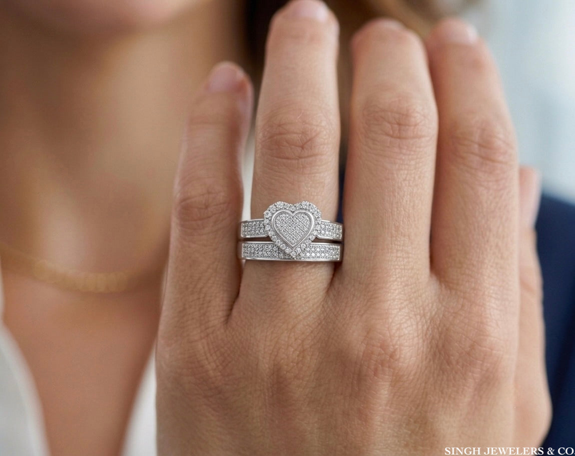 Sterling silver diamond heart bridal wedding ring set worn on finger