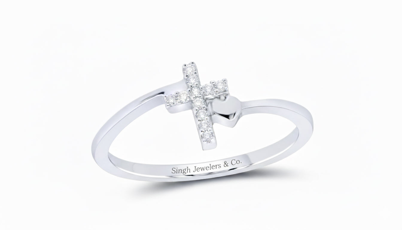 Silver ring with a cross design and 'Singh Jewelers & Co.' engraving on a white background