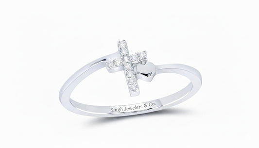 Silver ring with a cross design and 'Singh Jewelers & Co.' engraving on a white background