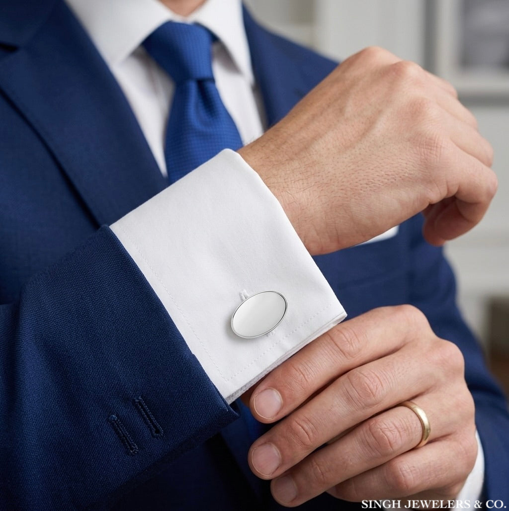 Man wearing stainless steel cufflinks with blue suit at wedding