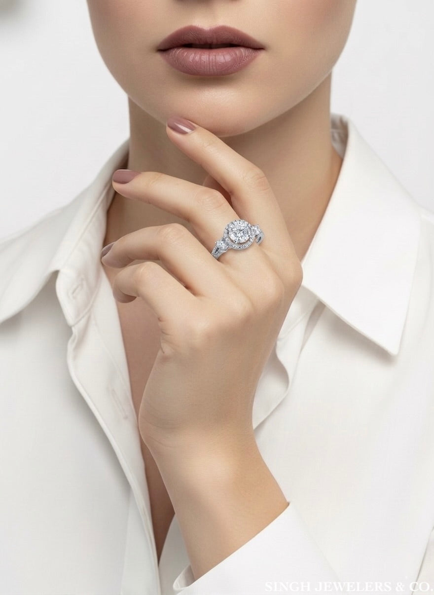 Woman wearing sterling silver split shank ring with white sapphires
