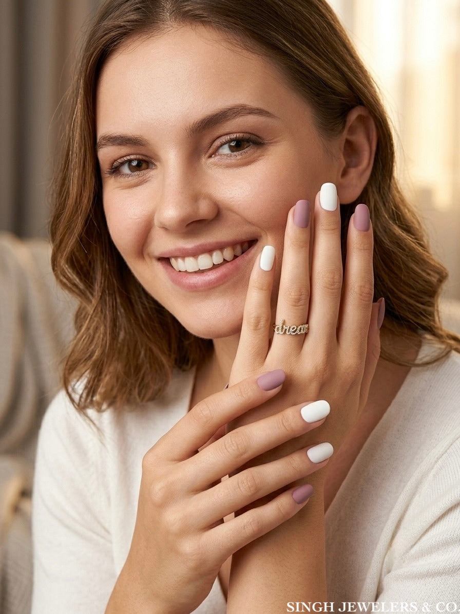 Woman wearing 10K yellow gold diamond dream ring